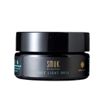 Sort dåse med SMUK skincare økologisk ansigtscreme