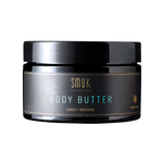 Sort dåse med SMUK skincare organic body butter med ingefær og mandarin